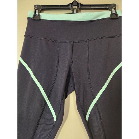 Lululemon Roll Out Crop Leggings Size 6 Black and Mint Green - Picture 2 of 7